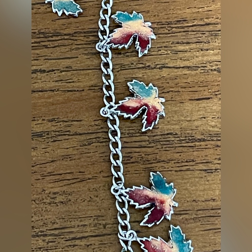 Silver bracelet, with multi colored maple leaves